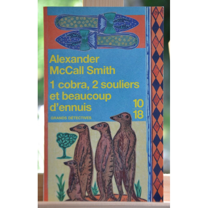 Livre d'occasion 1 cobra, 2 souliers et beaucoup d'ennuis par A. McCall Smith format poche 10*18