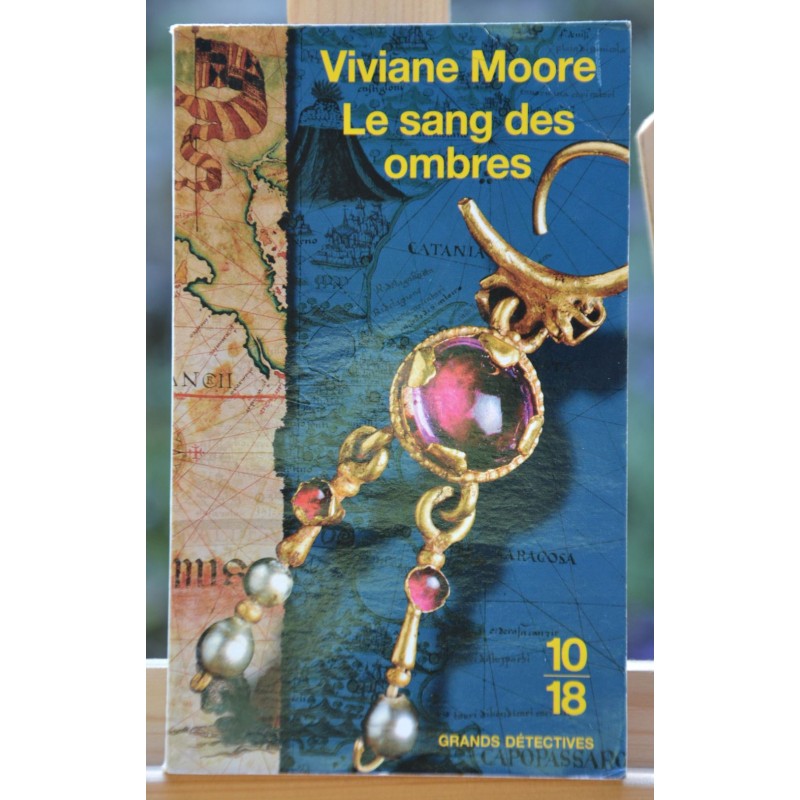 Livre d'occasion Le sang des ombres par Viviane Moore format poche 10*18